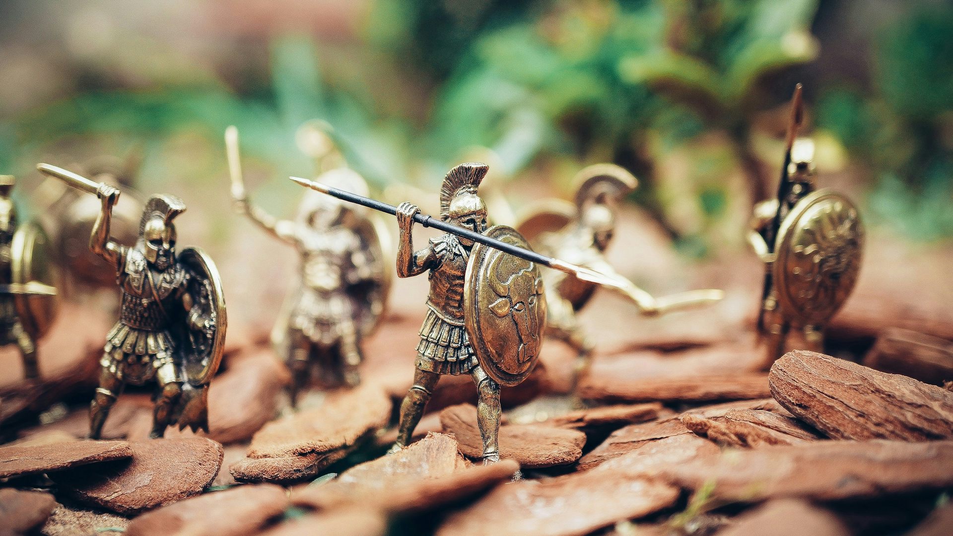 Toy soldiers are arranged on a battle field.