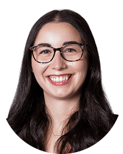 A smiling woman wearing glasses and a red shirt.