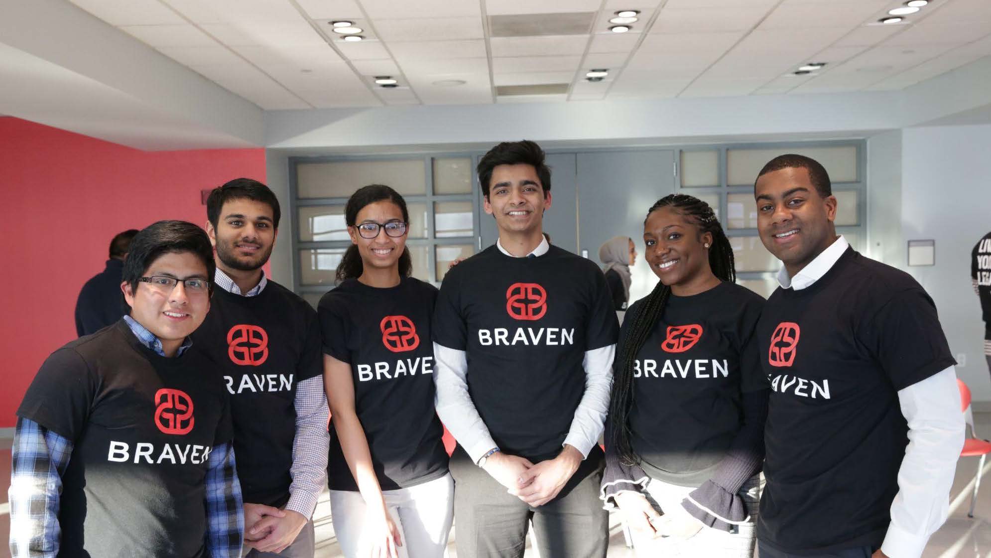 A group of people wearing t - shirts with the word braven.