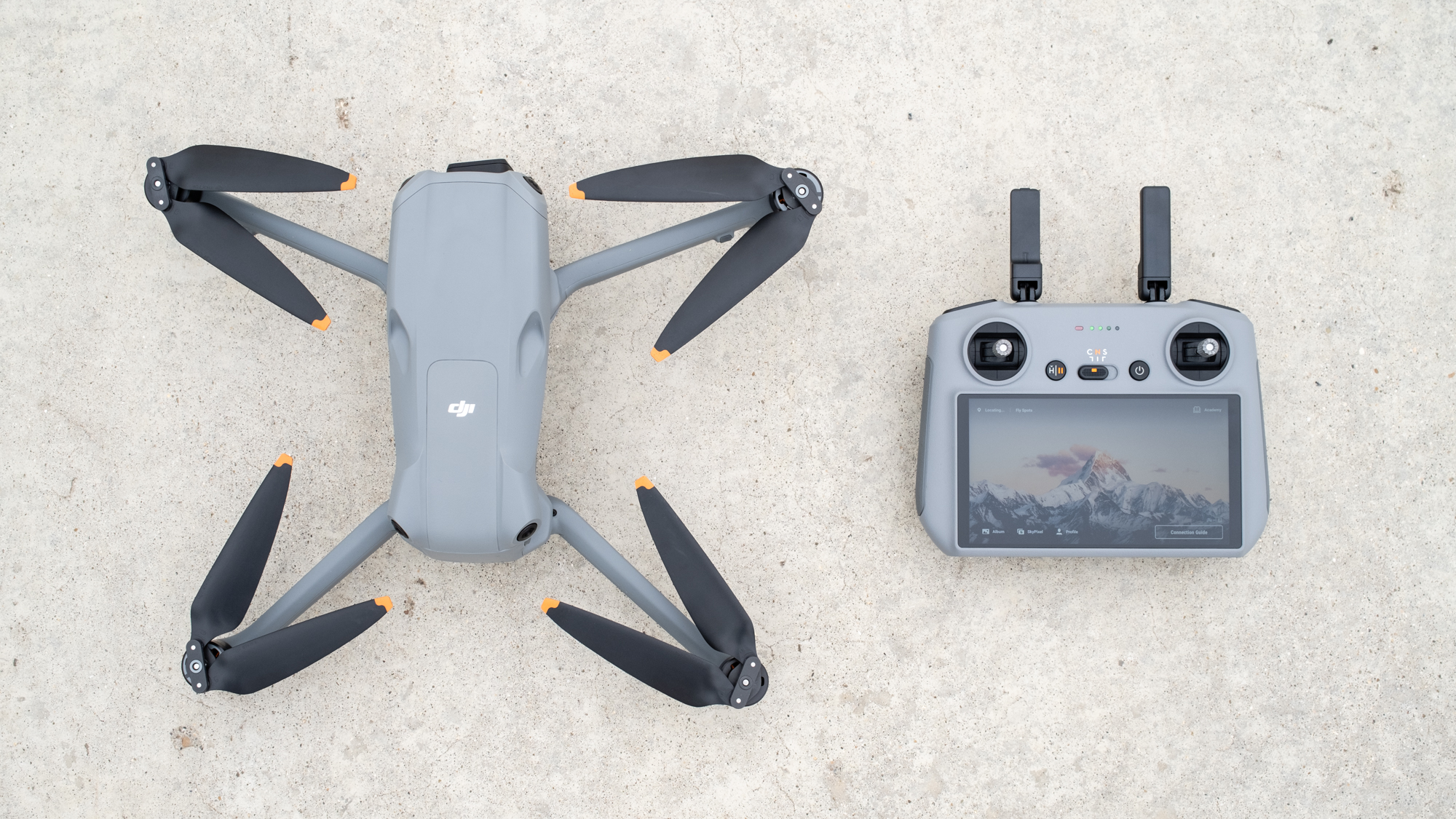 DJI Air 3 Product Image_drone open, above view with controller.