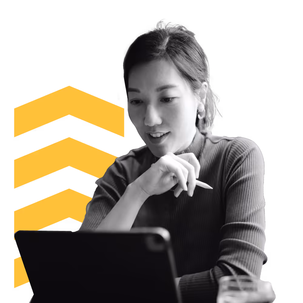 Woman using a tablet with a stylus pen in hand, with yellow upward arrows behind her.