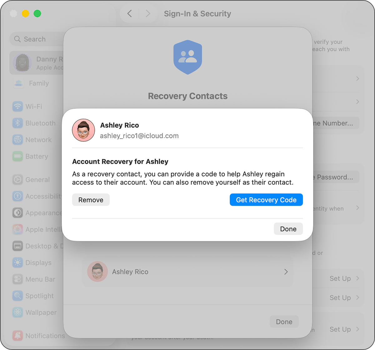 A Mac showing a System Settings window, with a button to Get Recovery Code.