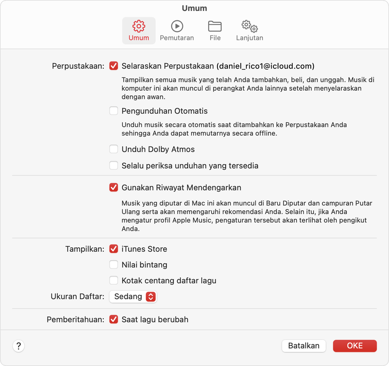 Pengaturan Apple Music menampilkan Selaraskan Perpustakaan yang diaktifkan.