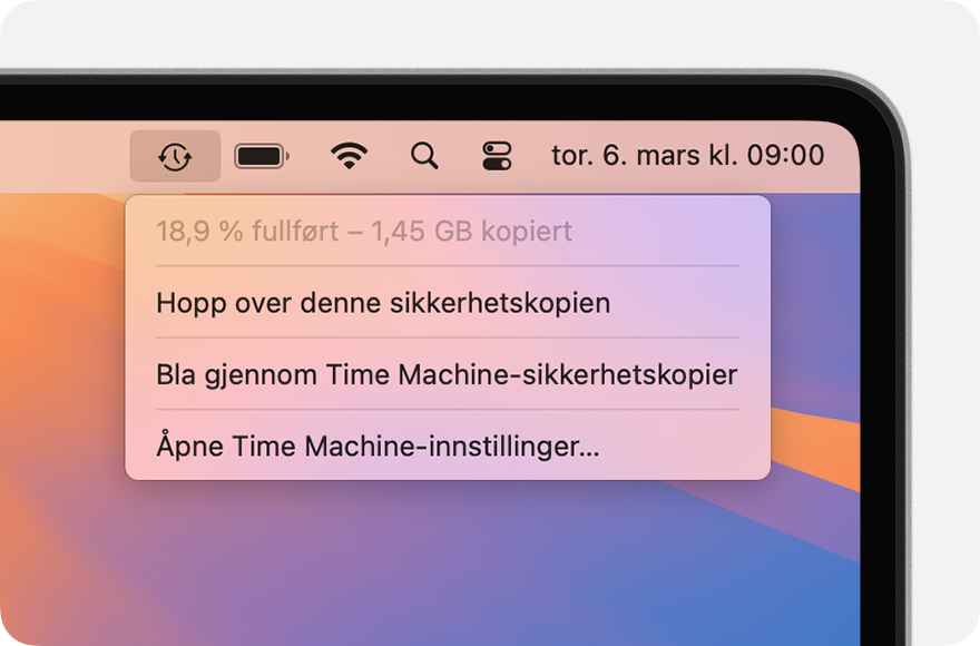 Time Machine-meny som viser en pågående sikkerhetskopiering vises.