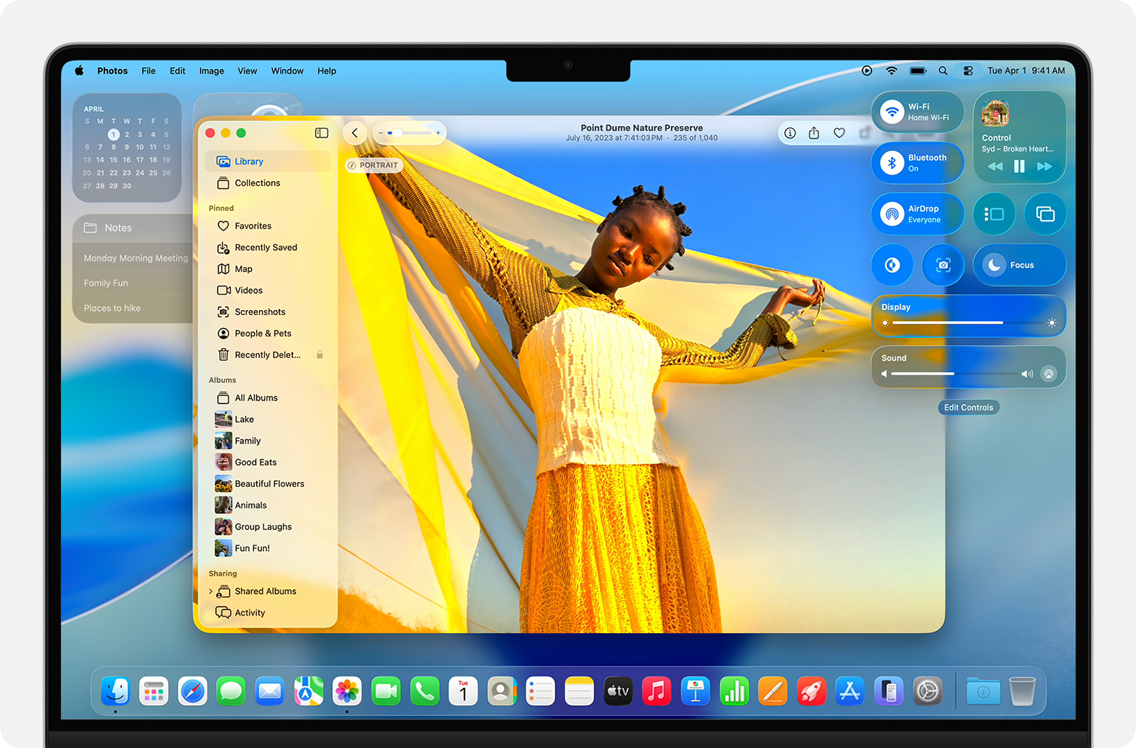 Screenshot of macOS Tahoe displaying a photo of a person with a yellow shawl in the Photos app.
