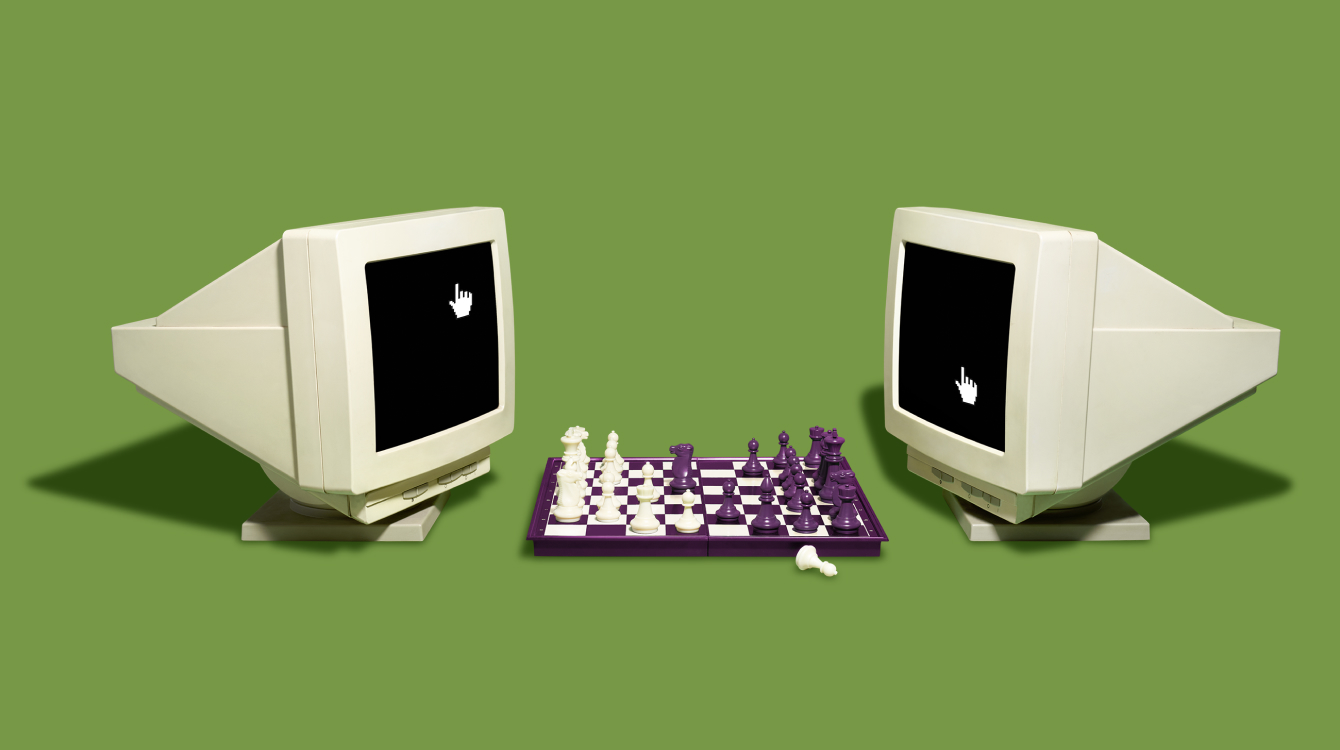 Two computers playing chess representing AI