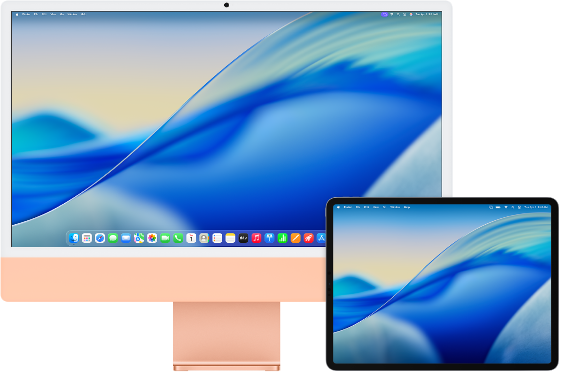 Một iMac và một iPad ở cạnh nhau.