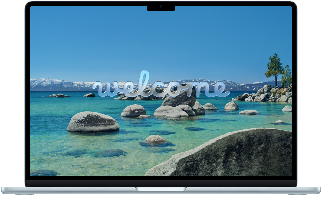 A MacBook Air with the lid open. The display shows the word “Welcome.”