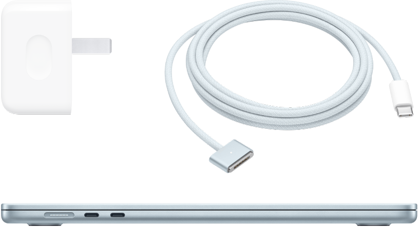 Güç adaptörü ve şarj kablosu ile MacBook Air’in yandan görünümü.
