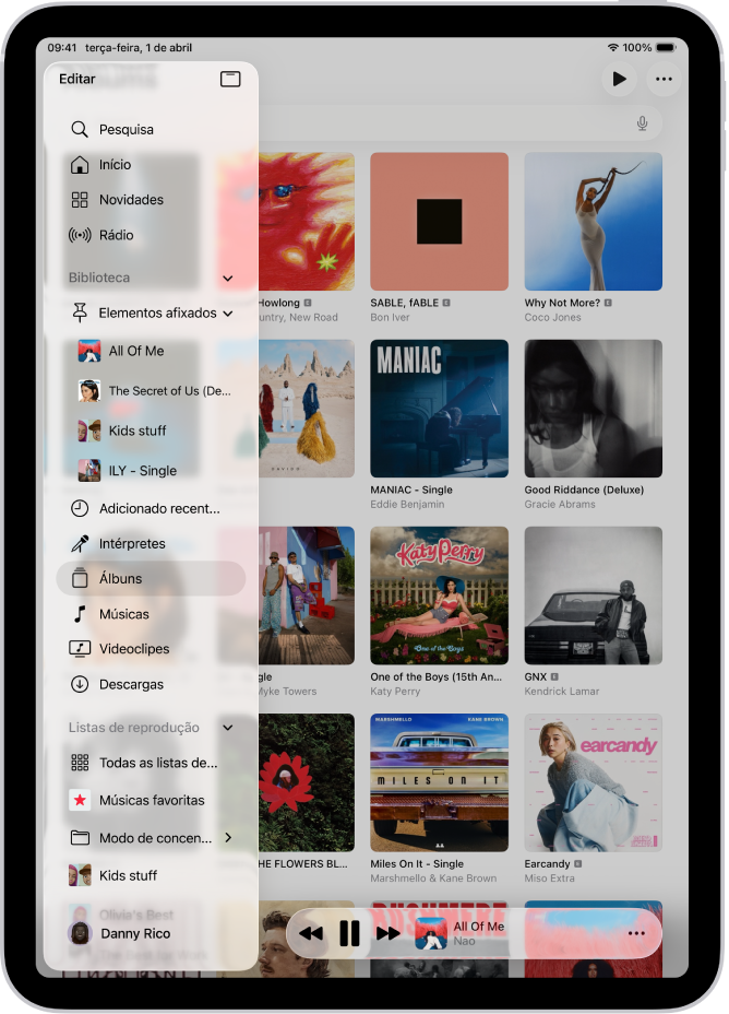 A aplicação Música aberta no iPad mostra a barra lateral à esquerda e os álbuns à direita. O minileitor está na parte inferior.