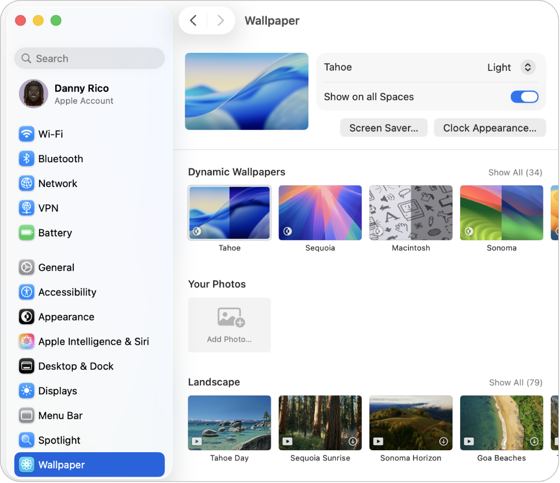 The System Settings window, with Wallpaper settings selected in the sidebar and Tahoe Dynamic Wallpaper (Light) selected on the right.