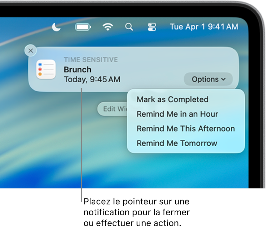Une notification d’app pour un rappel dans le coin supérieur droit du bureau, avec les options « Marquer comme terminé » et « Rappel dans 1 heure ».