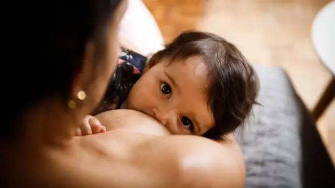 mother breastfeeding her baby