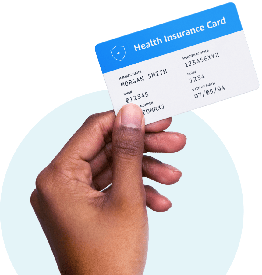 Insurance accepted Hand holding insurance card