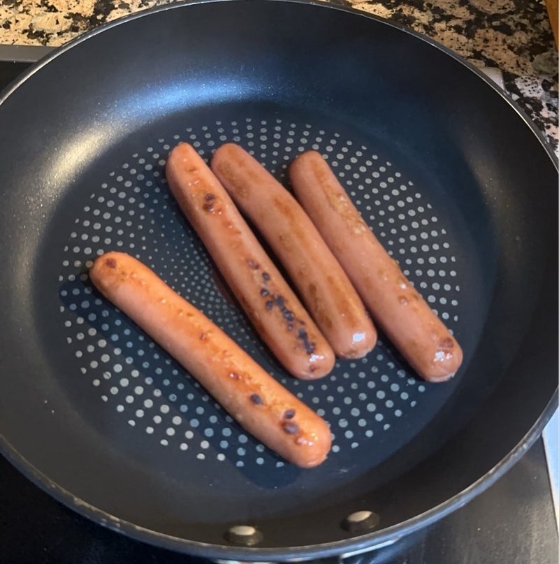 興奮しソーセージを焼いた旦那の画像