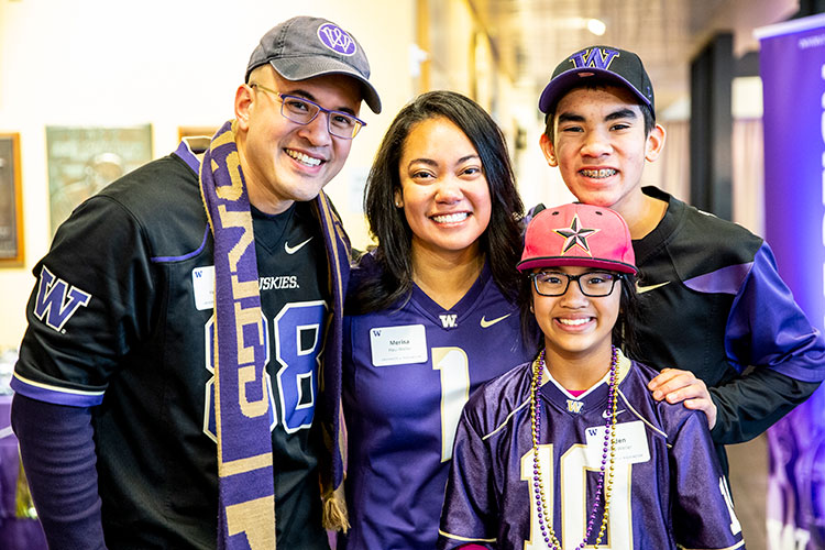 Family dressed in Husky gear