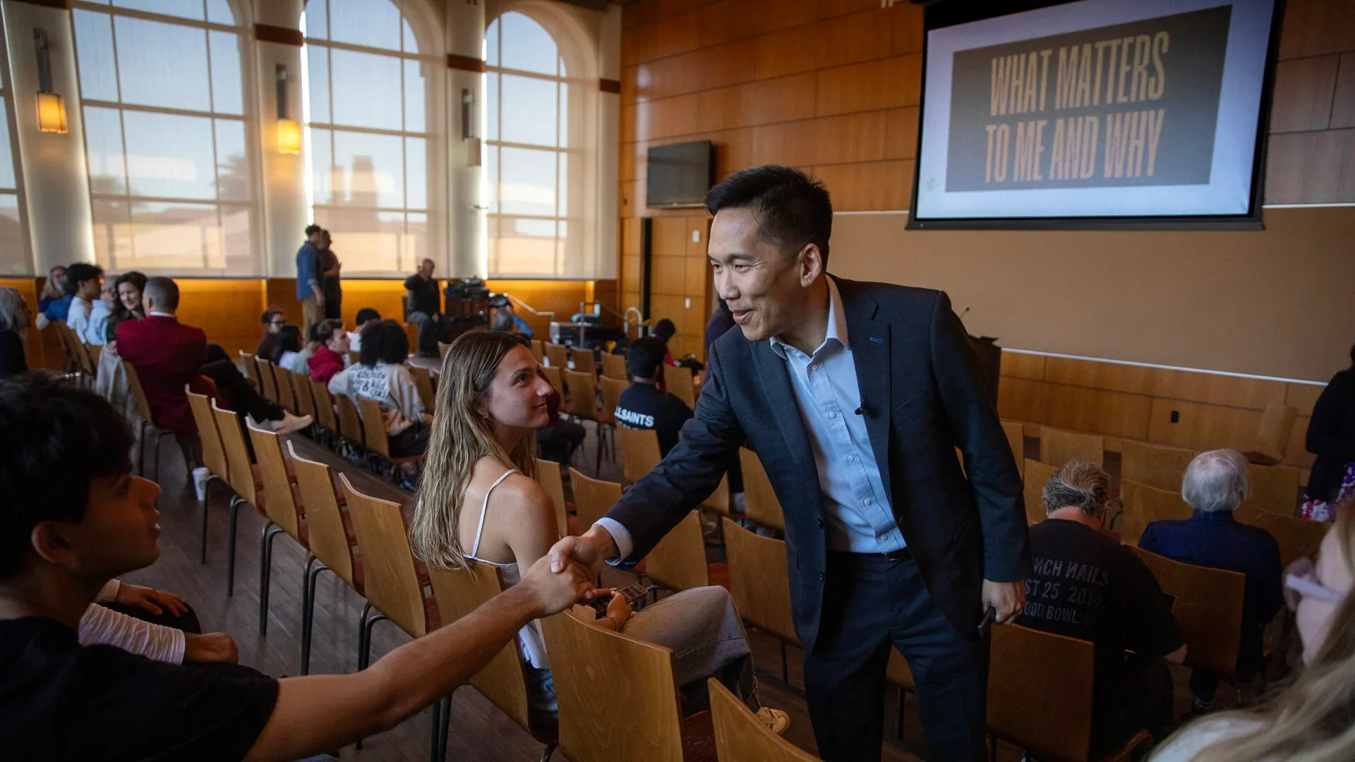 The president greets audience members in the Ronald Tutor Campus Center. (USC Photo/Brian van de Brug)